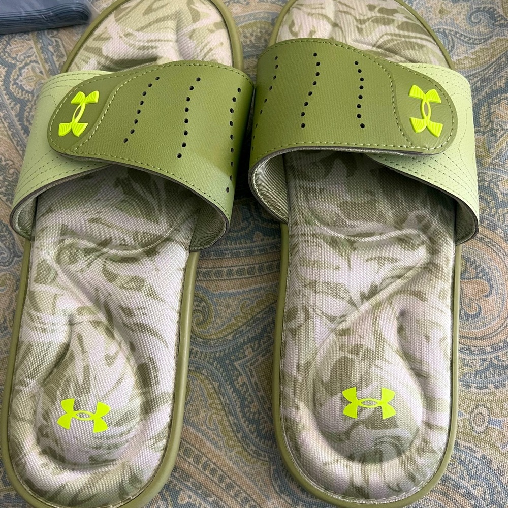 New Under Armor slides. Size 10 women’s, never worn.